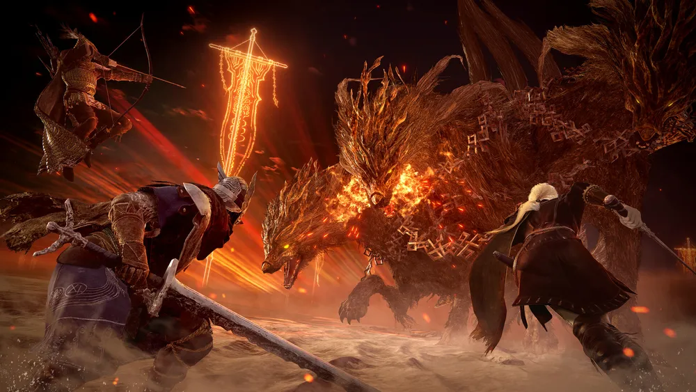 Three Nightfarers charge a huge, fire-wreathed three-headed beast in Elden Ring Nightreign.