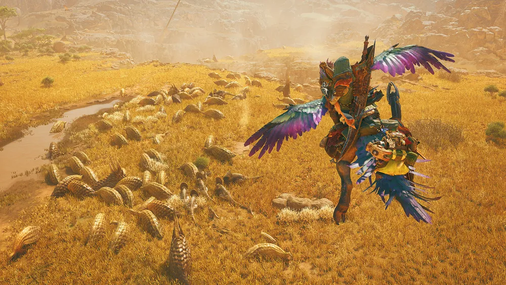 Several hunters confront a huge creature in Monster Hunter Wilds.
