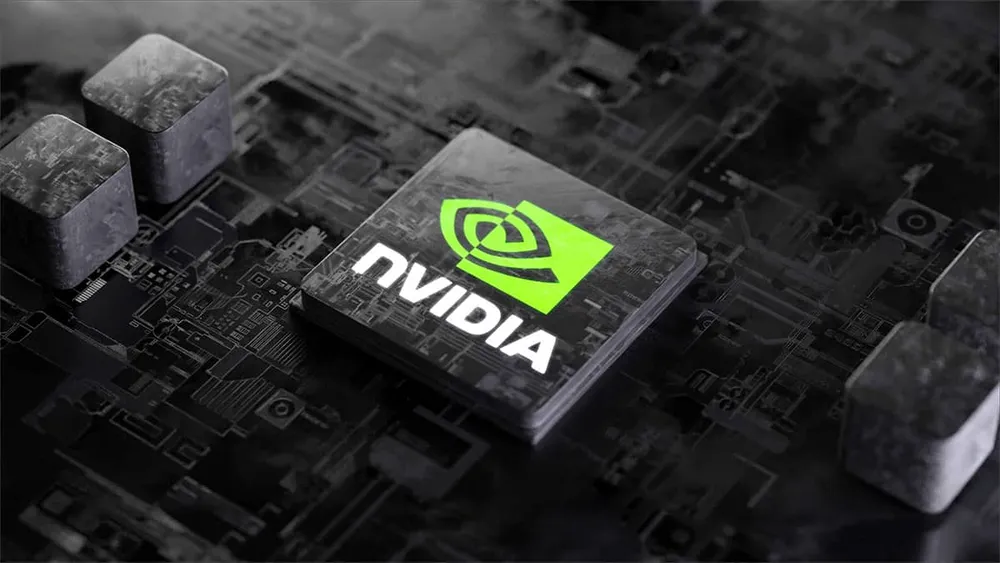 The green Nvidia logo etched onto a dark processor chip sitting on a circuit board.