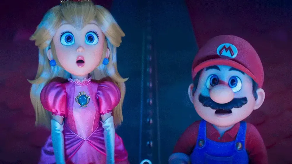 Princess Peach and Mario stare wide-eyed in a scene from The Super Mario Galaxy Movie.