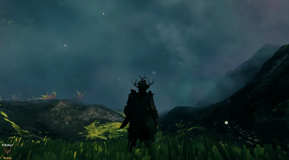 A Valheim player surrounded by thick grey fog on steep, jagged Mistlands terrain, with visibility cut to a few meters.